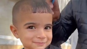 Watch: Displaced children in Gaza embrace free haircuts amid war