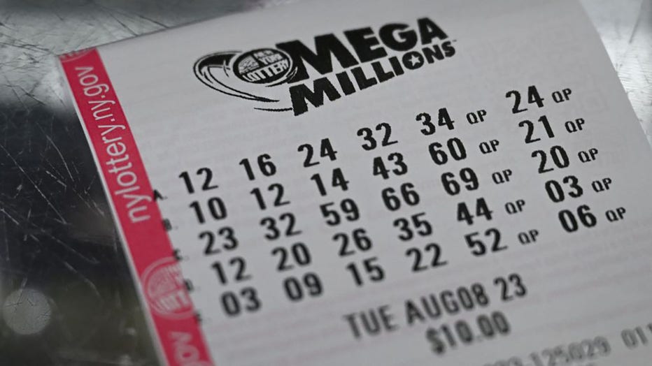 FILE - A Mega Millions lottery ticket in New York City on Aug. 8, 2023. (Photo by ANGELA WEISS/AFP via Getty Images)