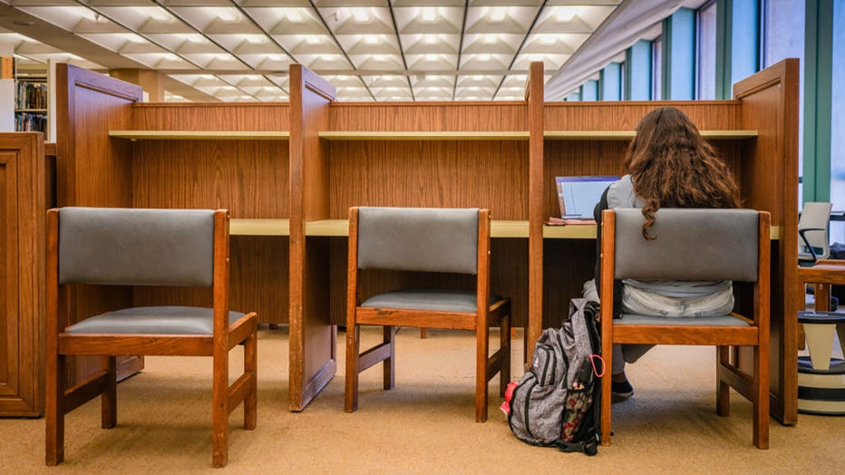 FILE - A student studies in the Perry-Castaneda Library at the University of Texas at Austin on Feb. 22, 2024, in Austin, Texas. (Photo by Brandon Bell/Getty Images)