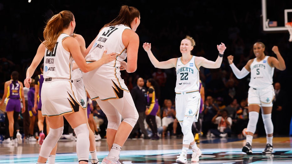 NEW YORK, NEW YORK - SEPTEMBER 07: The New York Liberty celebrate a three pointer from Stefanie Dolson #31 against the Los Angeles Sparks at the Barclays Center on September 07, 2023 in the Brooklyn borough of New York City. NOTE TO USER: User expressly acknowledges and agrees that, by downloading and or using this photograph, User is consenting to the terms and conditions of the Getty Images License Agreement. (Photo by Bruce Bennett/Getty Images)