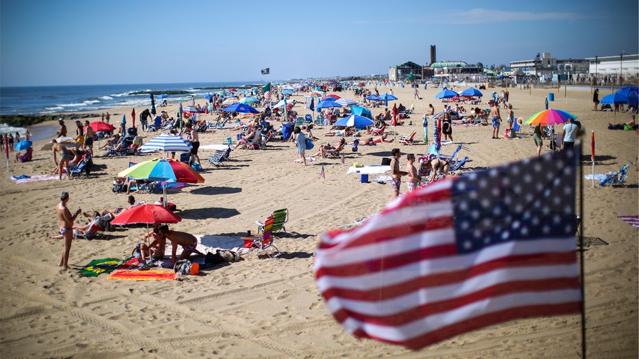 ASBURY PARK, NJ - MAY 26: People visit the beach during Memorial Day weekend on May 26, 2019 in Asbury Park, New Jersey. Memorial Day is the unofficial start of summer and this year New Jersey has banned smoking and vaping on nearly every public beach under tougher new restrictions. (Photo by Kena Betancur/Getty Images)