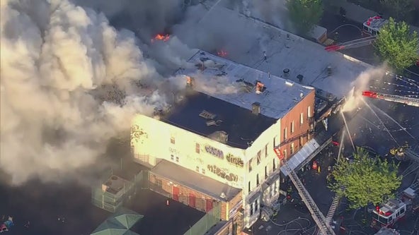 FDNY battling 5-alarm supermarket fire that spread to multiple buildings in Brooklyn