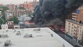 Massive fire in the Bronx engulfs row of stores; three firefighters injured