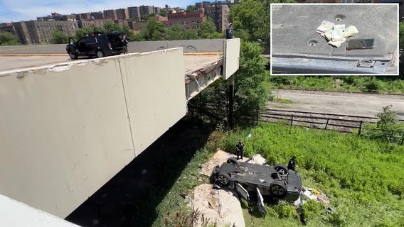 NYC mystery? Porsche plunges from parking garage; wads of cash found on wreck