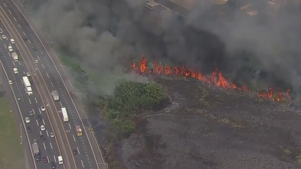Large fire near NJ Turnpike in Secaucus put out after slowing traffic, halting rail service