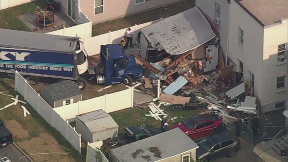 Tractor trailer crashes into Carteret, New Jersey house
