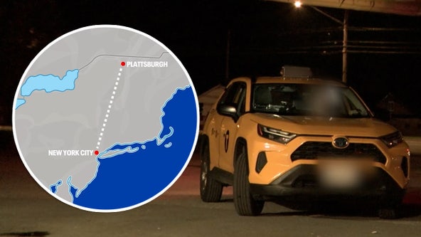 Yellow cabs wait near US-Canada border to drive migrants to NYC