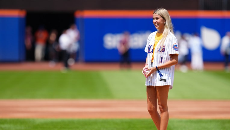 NEW YORK, NY - AUGUST 15: Haliey Welch throws out the first pitch during the game between the Oakland Athletics and the New York Mets at Citi Field on Thursday, August 15, 2024 in New York, New York. (Photo by Mary DeCicco/MLB Photos via Getty Images)
