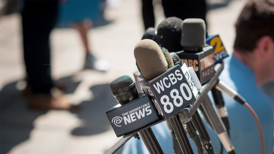 A collection of microphones, including WCBS880, at a news conference in New York on Wednesday, April 29, 2015. CBS announced it will sell its radio business which in the New York market includes 1010WINS and WCBS880. CBS owns a total of 117 radio station in 26 markets. (© Richard B. Levine) (Photo by Richard Levine/Corbis via Getty Images)
