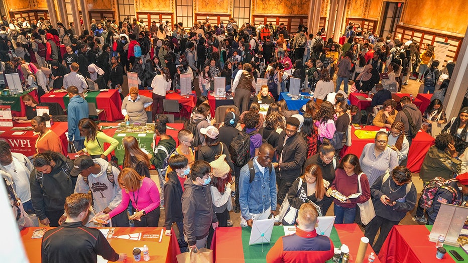 Students attend a college fair at the New York Public Library. 