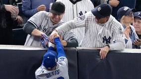 Yankees fans who interfered with Betts' catch are banned from Game 5 of the World Series