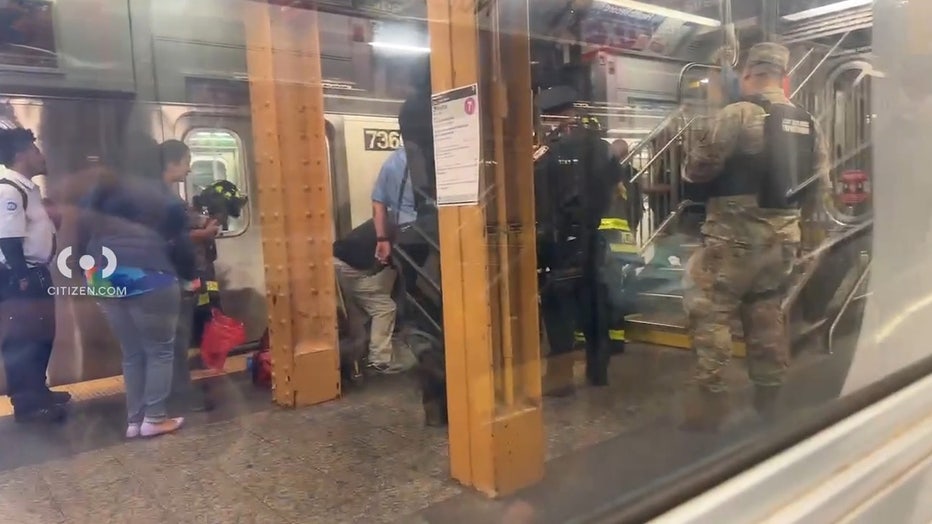 Woman, 82, pushed onto NYC subway tracks