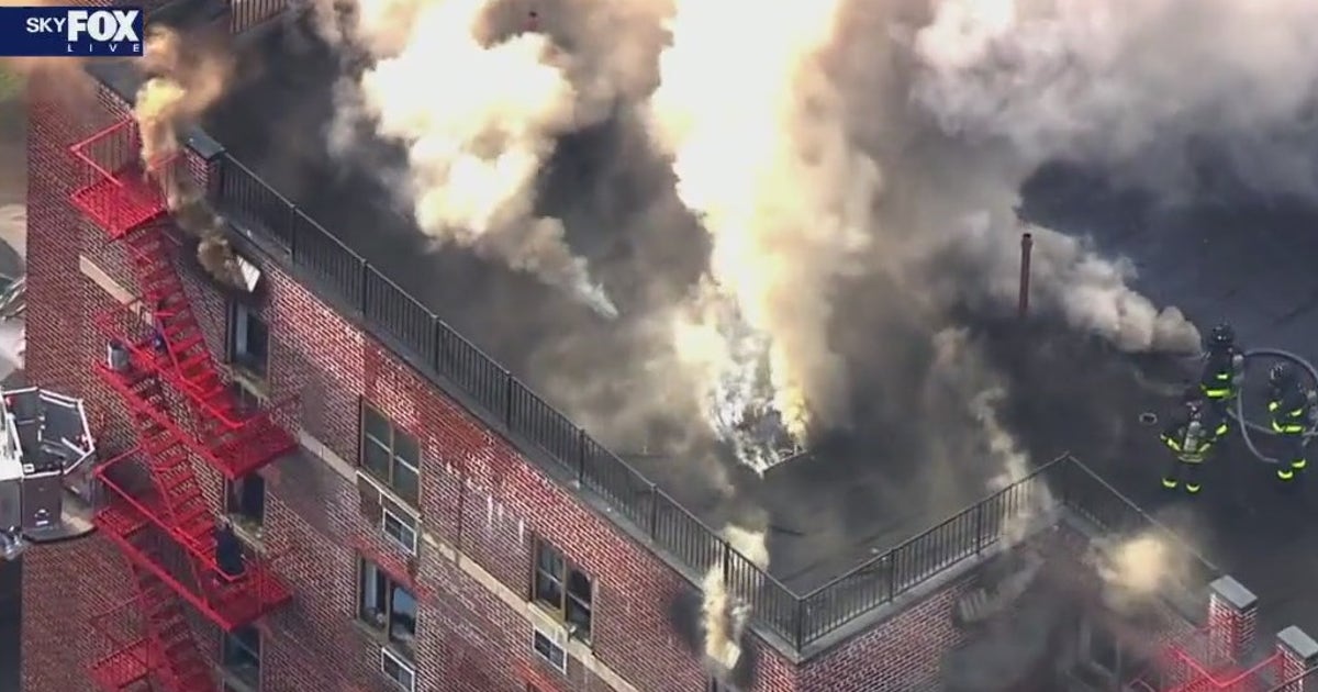 FDNY battles fire burning through Queens building roof | FOX 5 New York