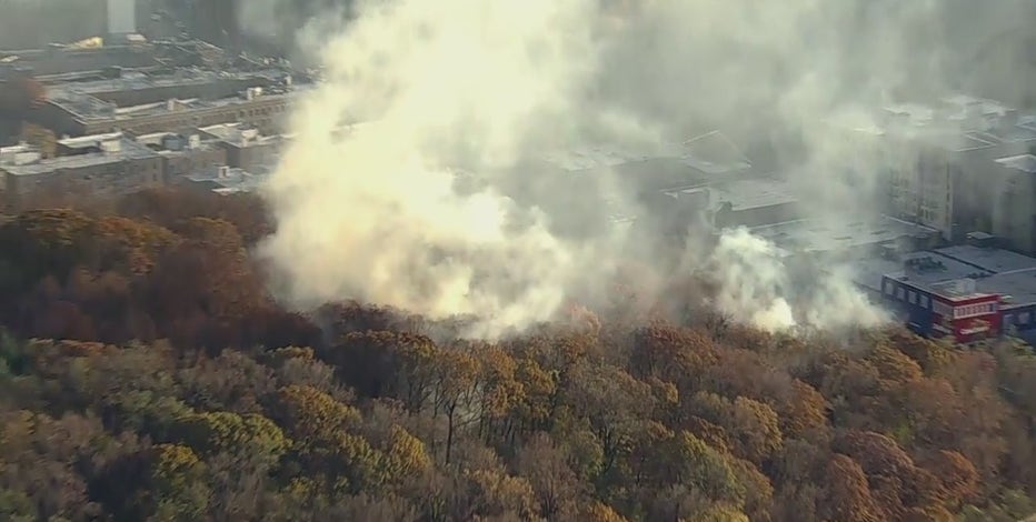 Firefighters battle stubborn wildfires in Queens and Manhattan