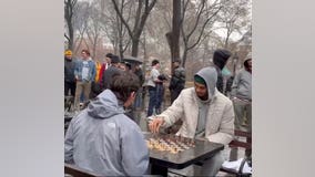 Victor Wembanyama plays chess in the rain at Washington Square Park