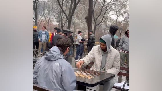 Victor Wembanyama plays chess in the rain at Washington Square Park