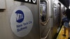 Woman pushed into NYC subway train entering station; man arrested