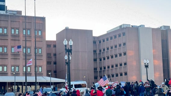 Awaiting Trump pardons, families of Jan. 6 rioters gather outside DC Jail
