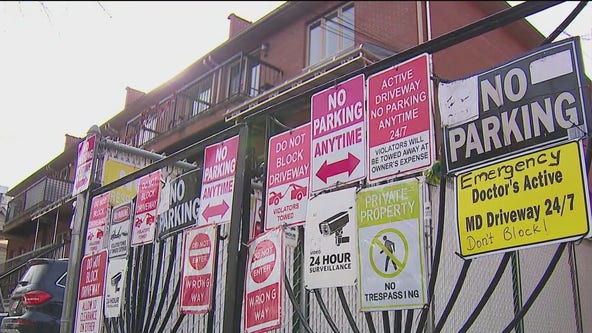 Brooklyn homeowners plaster 'NO PARKING' signs, cameras on front yard