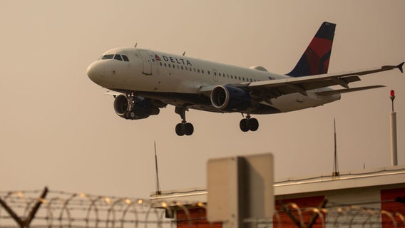Delta wing strikes runway while landing at LaGuardia Airport