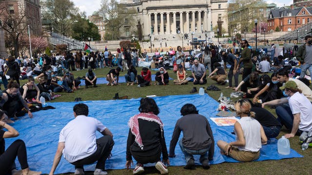 Columbia University's interim president steps down and returns to former post