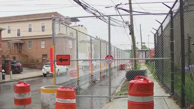 Private fence in East Elmhurst causes public outcry