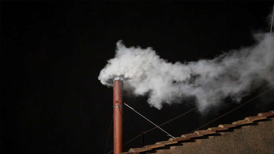 VATICAN CITY, VATICAN - MARCH 13: White smoke is seen from the roof of the Sistine Chapel indicating that the College of Cardinals have elected a new Pope on March 13, 2013 in Vatican City, Vatican. Pope Benedict XVI's successor - the 266th Pontiff - has been selected by the College of Cardinals in Conclave in the Sistine Chapel. (Photo by Peter Macdiarmid/Getty Images)