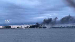 Boat catches fire near NYC's Hart Island, forcing 22 people into the water