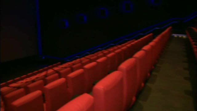 Sisters urge NY lawmakers to require more closed-captioned movie showings