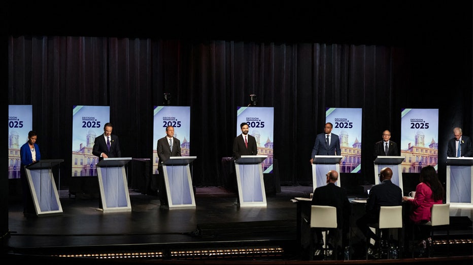 Democratic mayoral candidates (L/R) City Council Speaker Adrienne Adams, former Gov. Andrew Cuomo, city Comptroller Brad Lander, state Assemblymember Zohran Mamdani, state Sen. Zellnor Myrie, former city Comptroller Scott Stringer and former hedge fund manager Whitney Tilson stand on stage before the New York City Democratic Mayoral Primary Debate at the John Jay College of Criminal Justice in the Gerald W. Lynch Theater on June 12, 2025 in New York City. Seven candidates will be participating in the final debate before the Democratic primary election for mayor. (Photo by Vincent ALBAN / POOL / AFP) (Photo by VINCENT ALBAN/POOL/AFP via Getty Images)
