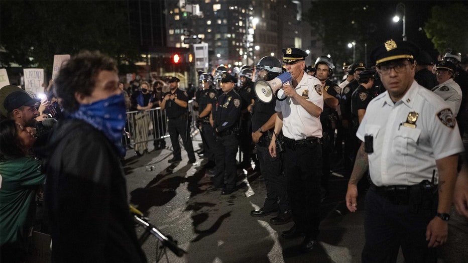 NEW YORK, UNITED STATES - JUNE 10: Protestors confront NYPD officers during an anti-ICE protest outside 26 Federal Plaza Building in New York City, New York, U.S., June 10, 2025. (Photo by Mostafa Bassim/Anadolu via Getty Images)