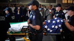 Slain NYPD officer hailed as hero as flags fly half-staff to honor NYC shooting victims