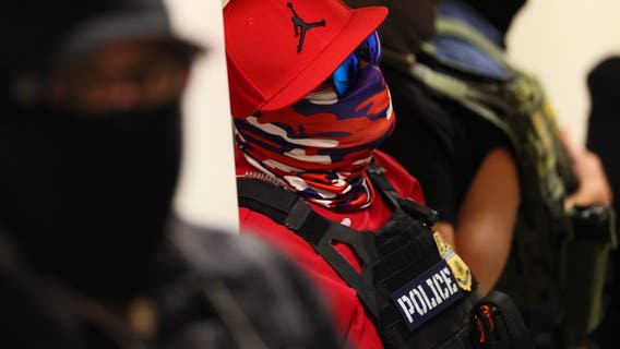 Should ICE agents be wearing masks while enforcing the law?