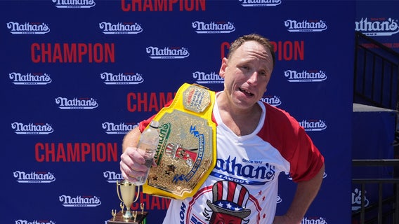 Joey Chestnut reclaims title in Famous hot dog eating contest, wins 17th Mustard Belt