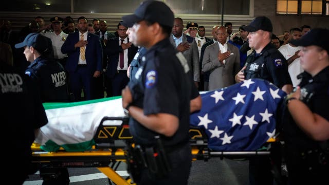 Slain NYPD officer hailed as hero as flags fly half-staff to honor NYC shooting victims