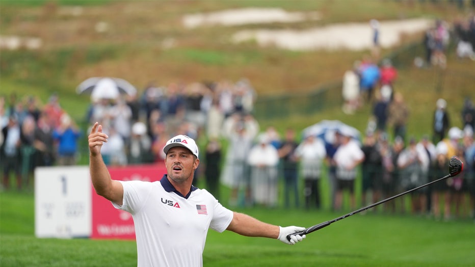 FARMINGDALE, NEW YORK - SEPTEMBER 25: Bryson DeChambeau of Team United States interacts with fans near the first tee box prior to the Ryder Cup at Black Course at Bethpage State Park Golf Course on September 25, 2025 in Farmingdale, New York. (Photo by Ben Jared/PGA TOUR via Getty Images)
