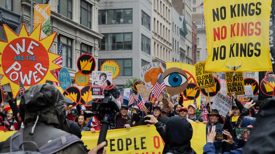 This is one of many No Kings Nationwide Day of Defiance protest events taking place throughout the United States on Flag Day 2025. Demonstrators display signs with a variety of slogans and are peacefully protesting actions by President Donald Trump and his administration. Tens of thousands of participants have been marching down Manhattan's Fifth Avenue from Bryant Park. This view shows the front of the march near its finish at Madison Square Park. (Photo by: John Senter/UCG/Universal Images Group via Getty Images)
