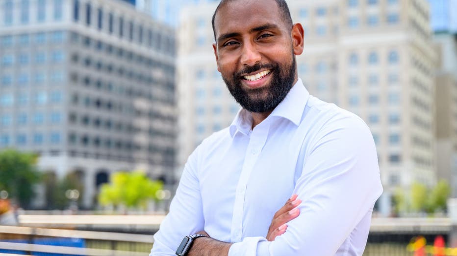 Mussab Ali with his arms crossed.