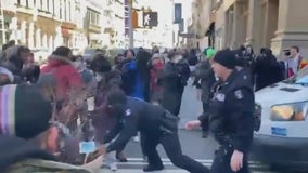 Multiple arrests after anti-ICE protesters clash with police in Chinatown