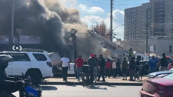 4 firefighters injured battling 5-alarm fire in Bronx auto shop