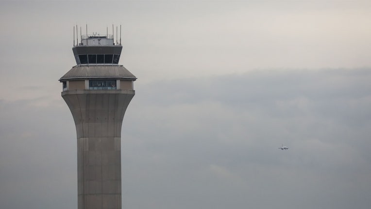 The FAA Air Traffic Control tower at Newark Liberty International Airport (EWR) in Newark, New Jersey, US, on Monday, Nov. 3, 2025. The Federal Aviation Administration issued a temporary ground stop for some flights to Newark Liberty International Airport on Sunday due to staffing, according to an advisory. Photographer: Michael Nagle/Bloomberg via Getty Images