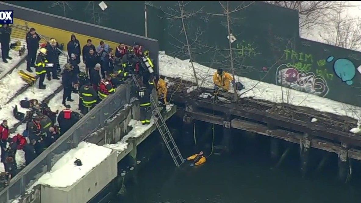 Apparent water rescue underway in East River near Pier 17
