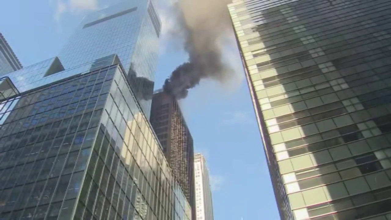 Fire sends smoke plumes near St. Patrick’s Day parade route in Midtown