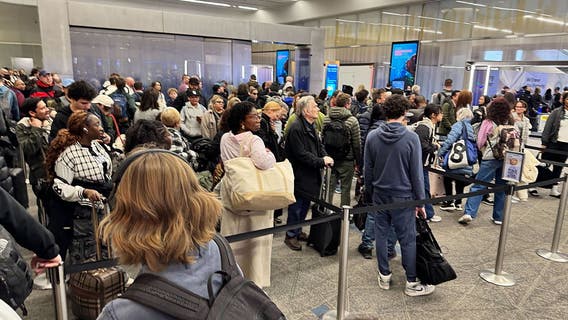 LGA wait times snarl as crash investigation continues