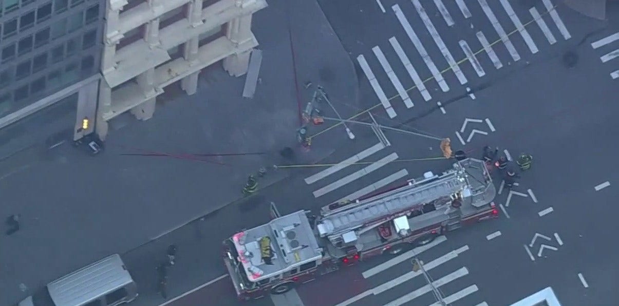Building facade collapses in Lower Manhattan during morning commute