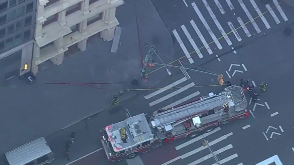 Building facade collapses in Lower Manhattan during morning commute