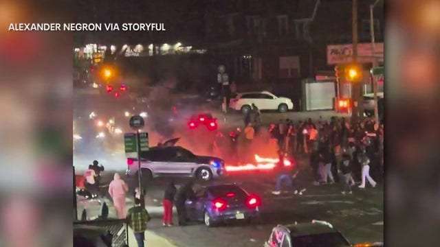 3 people jump on NYPD car, crack windshield during Queens street takeover