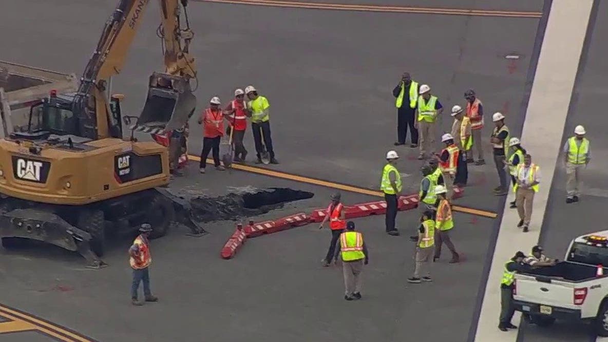 Latest on sinkhole chaos at LaGuardia airport