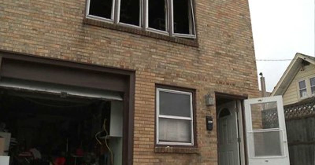 Two men save woman, dog after fire in West Allis | FOX6 Milwaukee