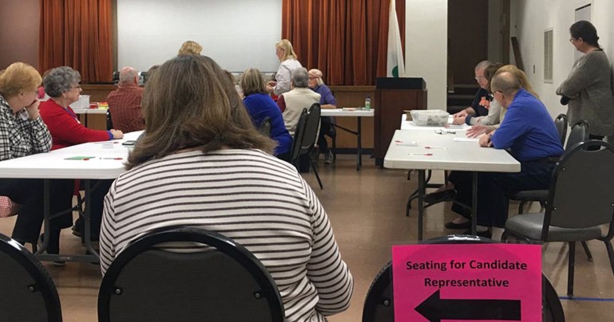 "Quicker than going through the machine:" Hand recount of ballots in ...